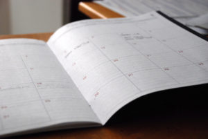 Common Misconceptions About Living Trusts - calendar planner on desk
